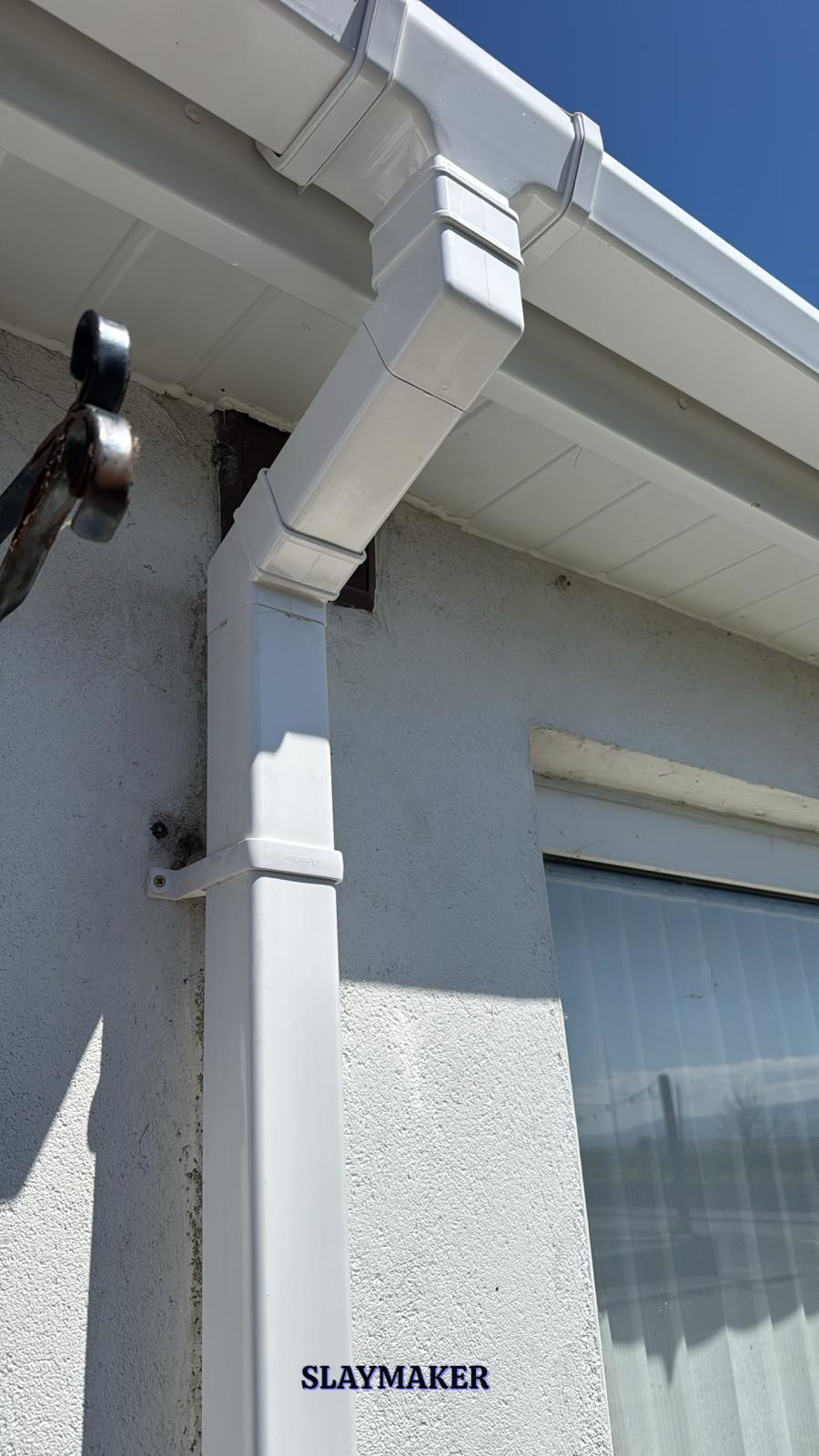 uPVC square section white gutter and downpipe.
